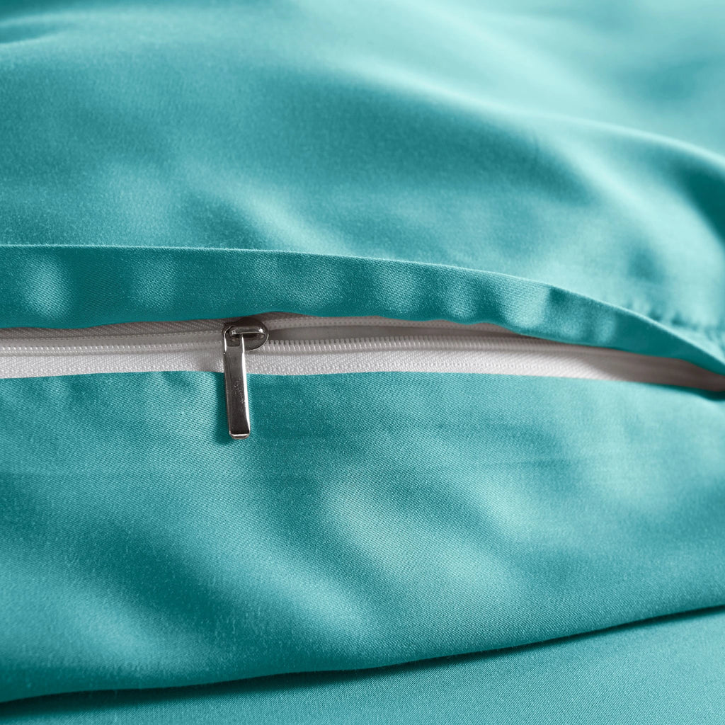 close-up of tiffany blue bamboo pillowcase with hidden tiffany blue zipper and smooth sateen finish