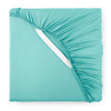 tiffany blue bamboo sateen fitted sheet corner with tiffany blue elastic strap, showing snug fit and smooth fabric texture