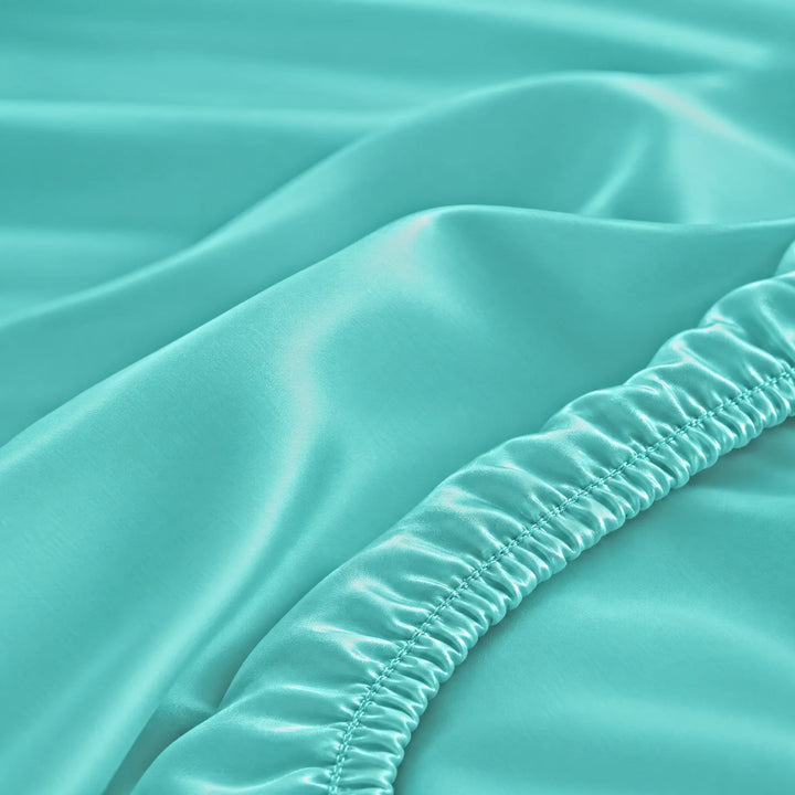 Tiffany Blue bamboo viscose fitted sheet stitched elastic hem macro close-up of smooth silky sateen, from the sheet set