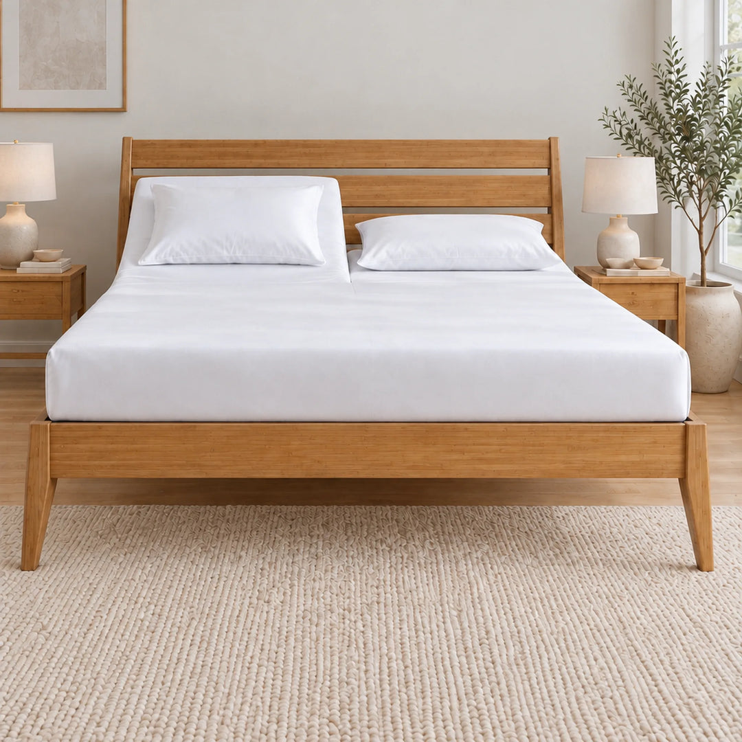 Foot of a Top Split King bed showing one continuous mattress under a single white bamboo viscose fitted sheet