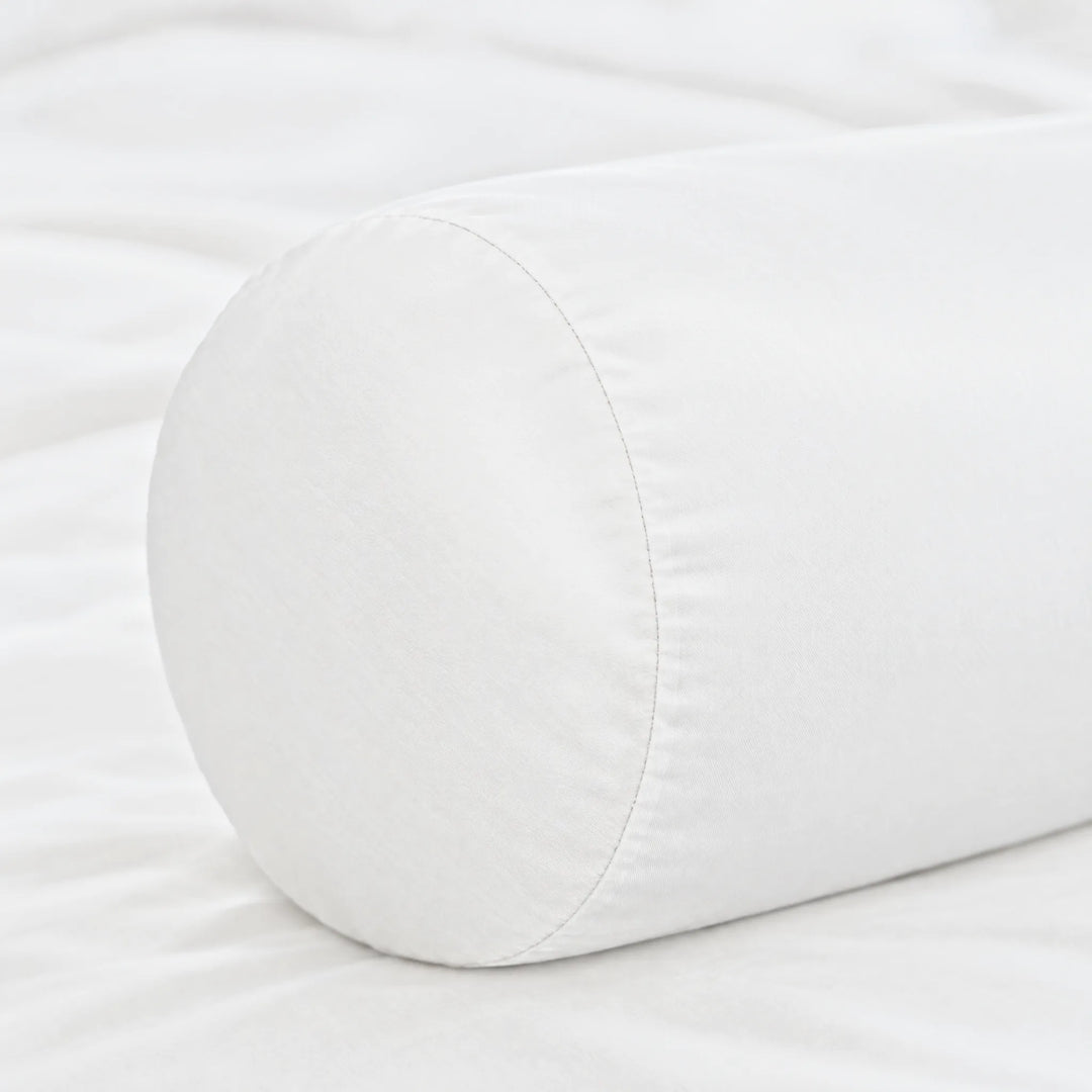 White bamboo viscose sateen bolster pillowcase, close-up of the smooth seamed end