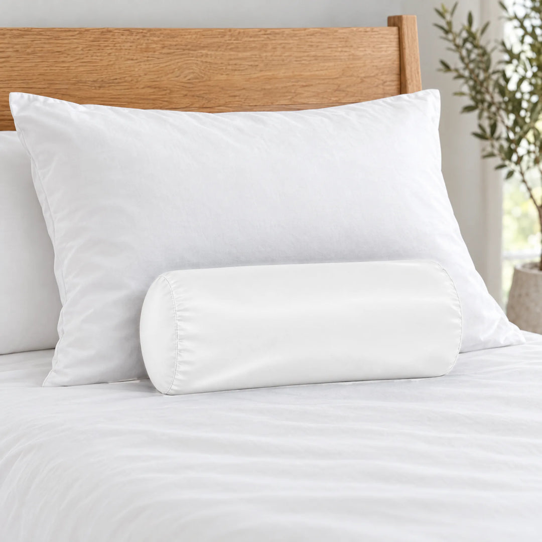 White bamboo viscose sateen bolster pillowcase (18 x 8 in) in front of a queen pillow to show true size