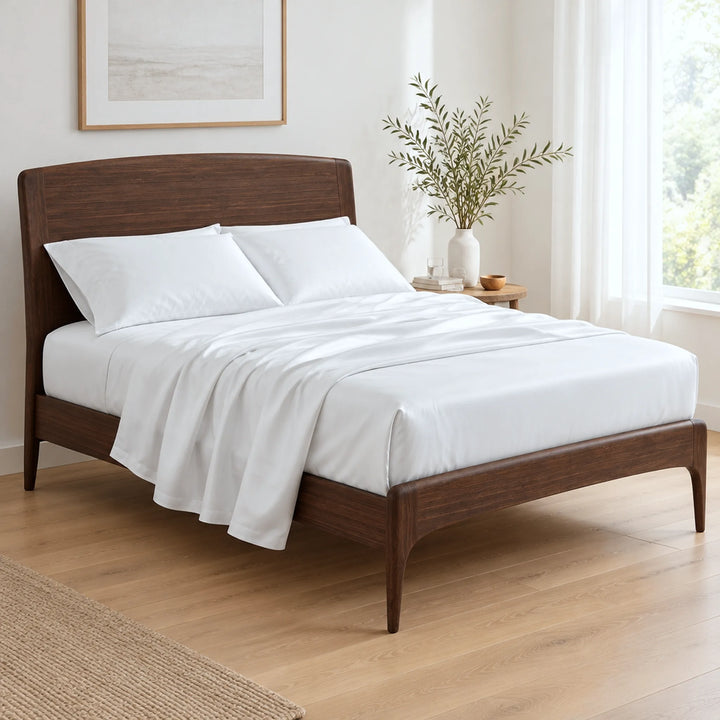 white bamboo viscose sateen sheet set, three-quarter view with the flat sheet pulled back over the fitted sheet
