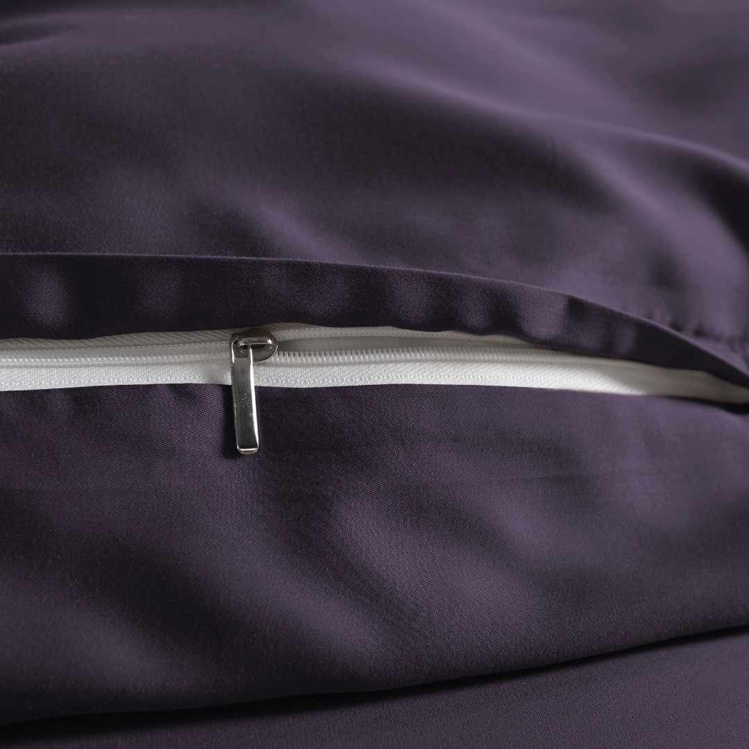 close-up of royal purple bamboo pillowcase with hidden white zipper and smooth sateen finish