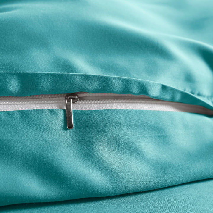 close-up of tiffany blue bamboo pillowcase with hidden tiffany blue zipper and smooth sateen finish